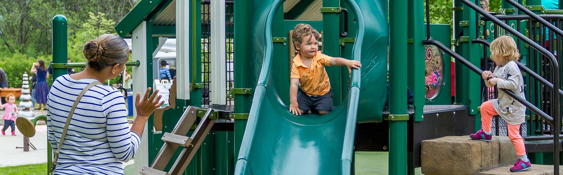 Families visit and play at the playground. Photo © Kmiecik Imagery.