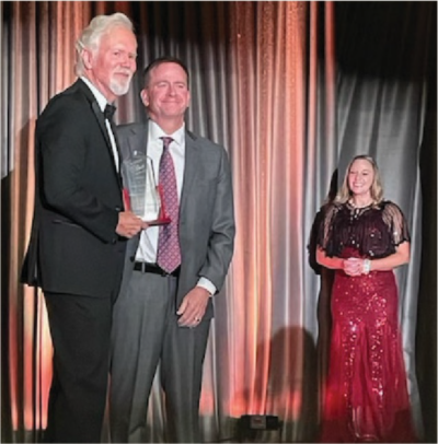 Michael Benard, Executive Director of the Wheaton Park District and President of the Play for All Playground and Garden Foundation, was thrilled to accept an award on behalf of the Wesley Luehring Foundation at the Illinois Association of Park Districts(IAPD)